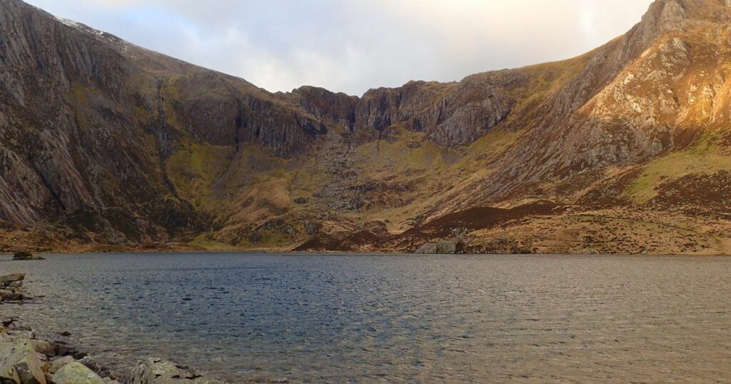 A lake in front of mountainous area