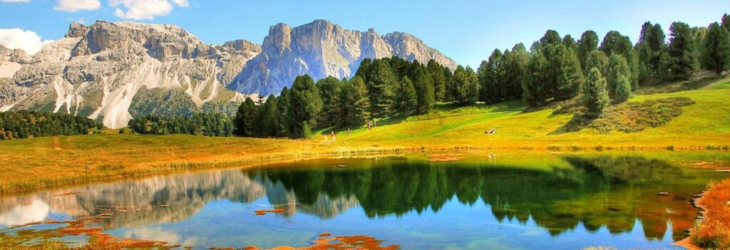 Mountains and lake landscape in Dolomites.