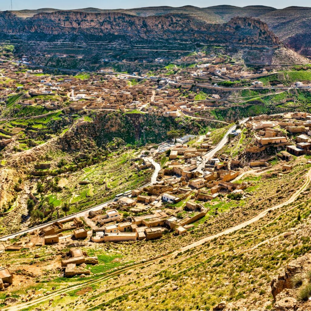View of valley with mountains in background