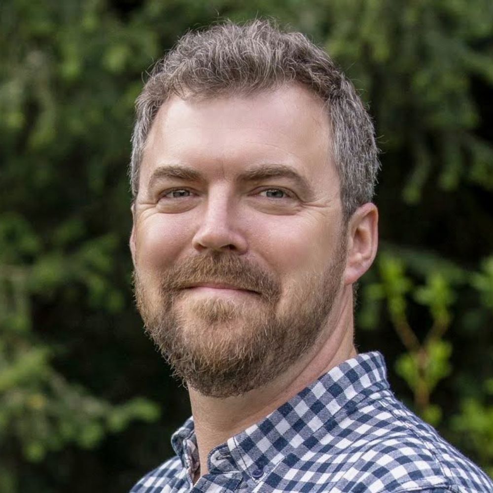 Close up photograph showing Paul Rowland, Plantlife’s Conservation Land Manager