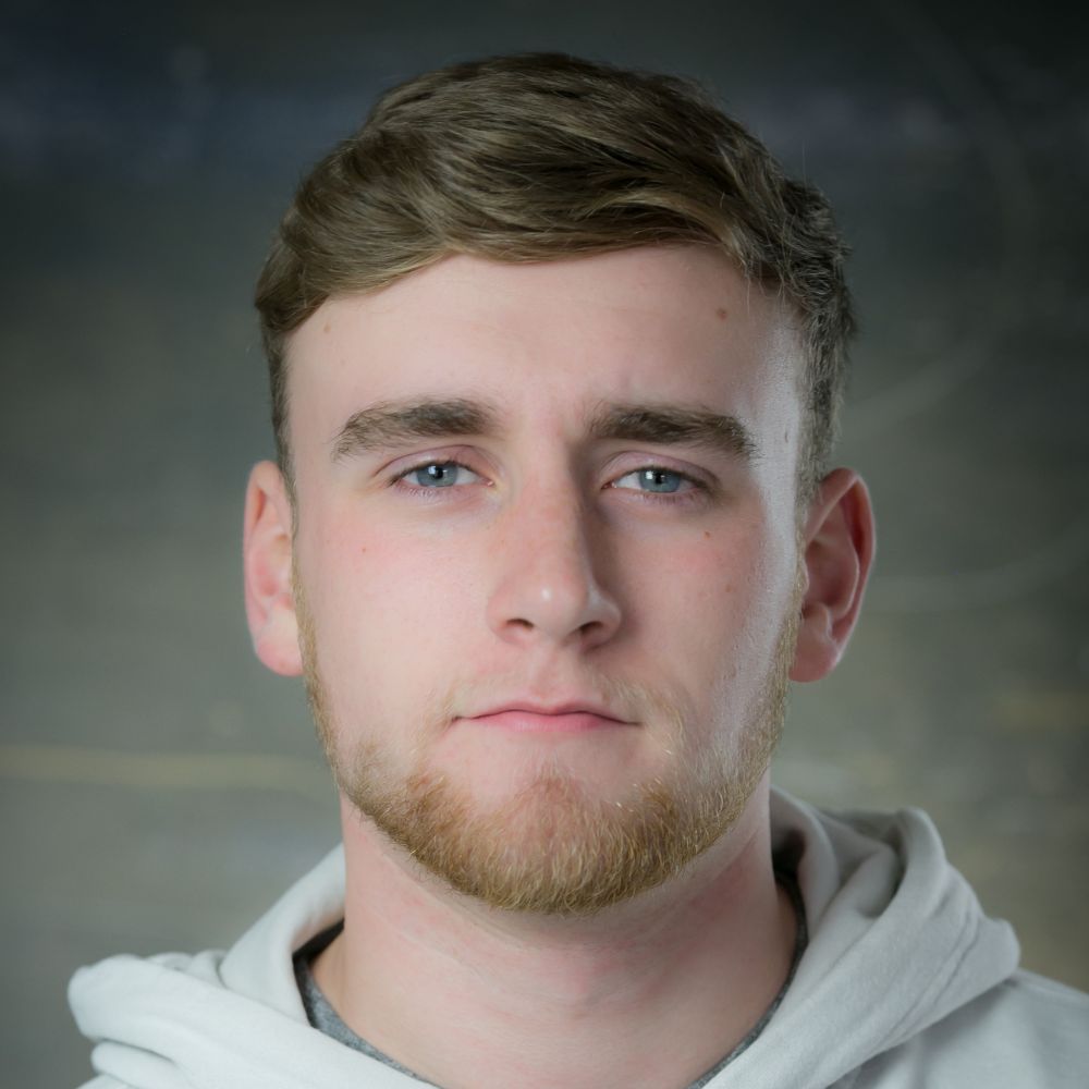 Close up photograph of Teddy Jones, Assistant Gardener and Visitor Experience Assistant at Castlefield Viaduct