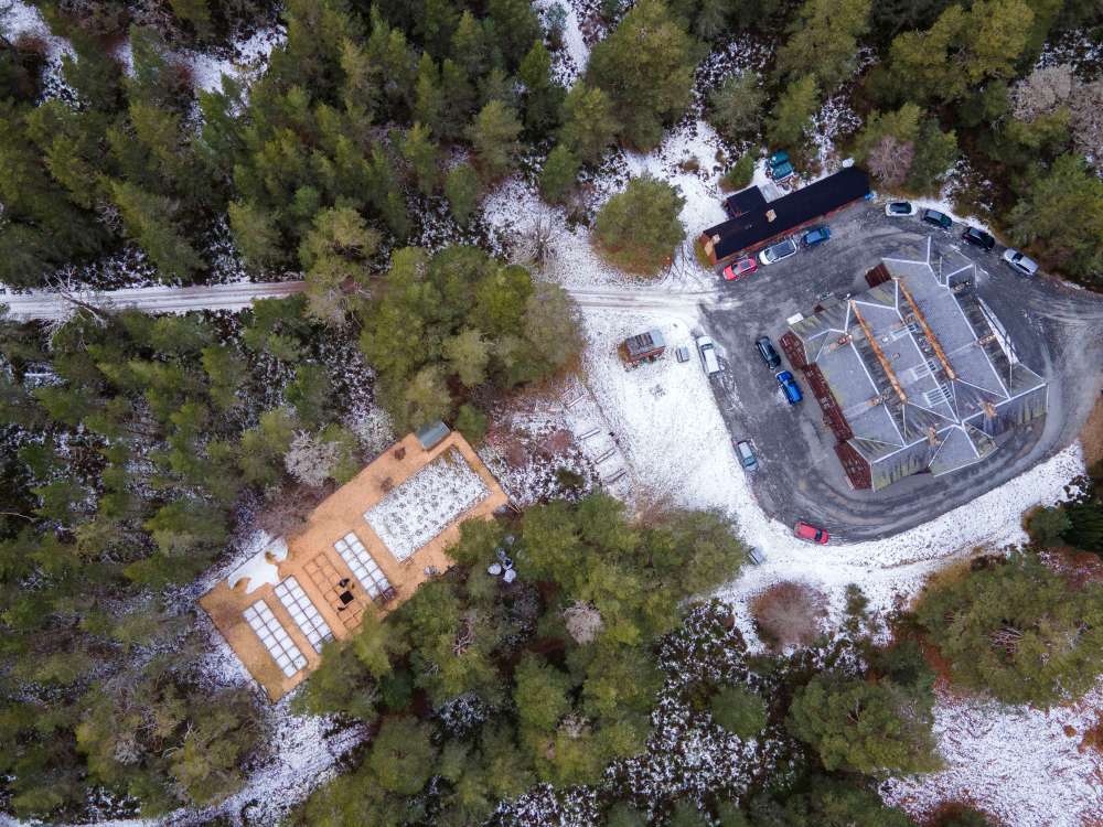 Photograph shows an aerial view taken from a drone, looking down at the Twinflower Nursery site in the Cairngorms
