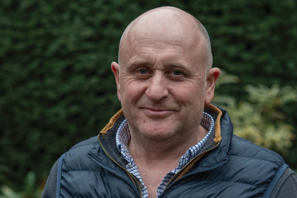 Photograph shows a close up of nature friendly farmer, Hywel Morgan